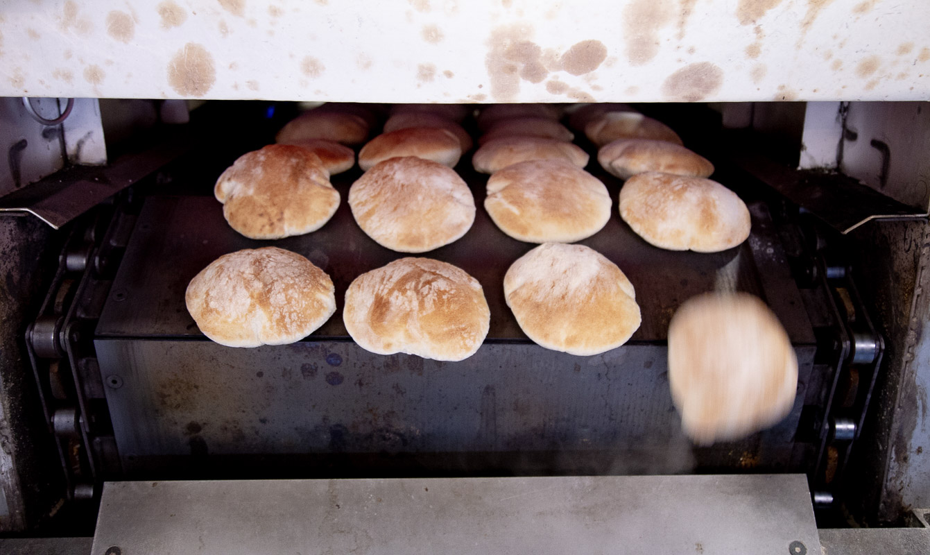 Freshly baked pita from the Clover Commissary oven, using local wheat